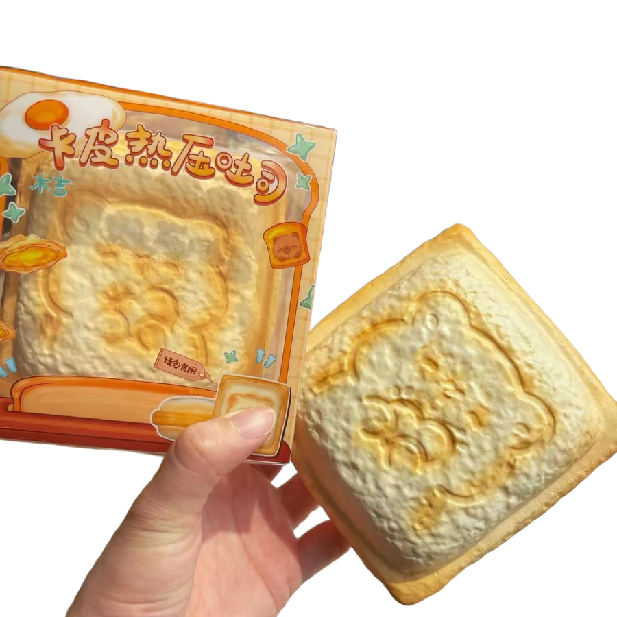 Capybara Panini Toast Squishy held in hand