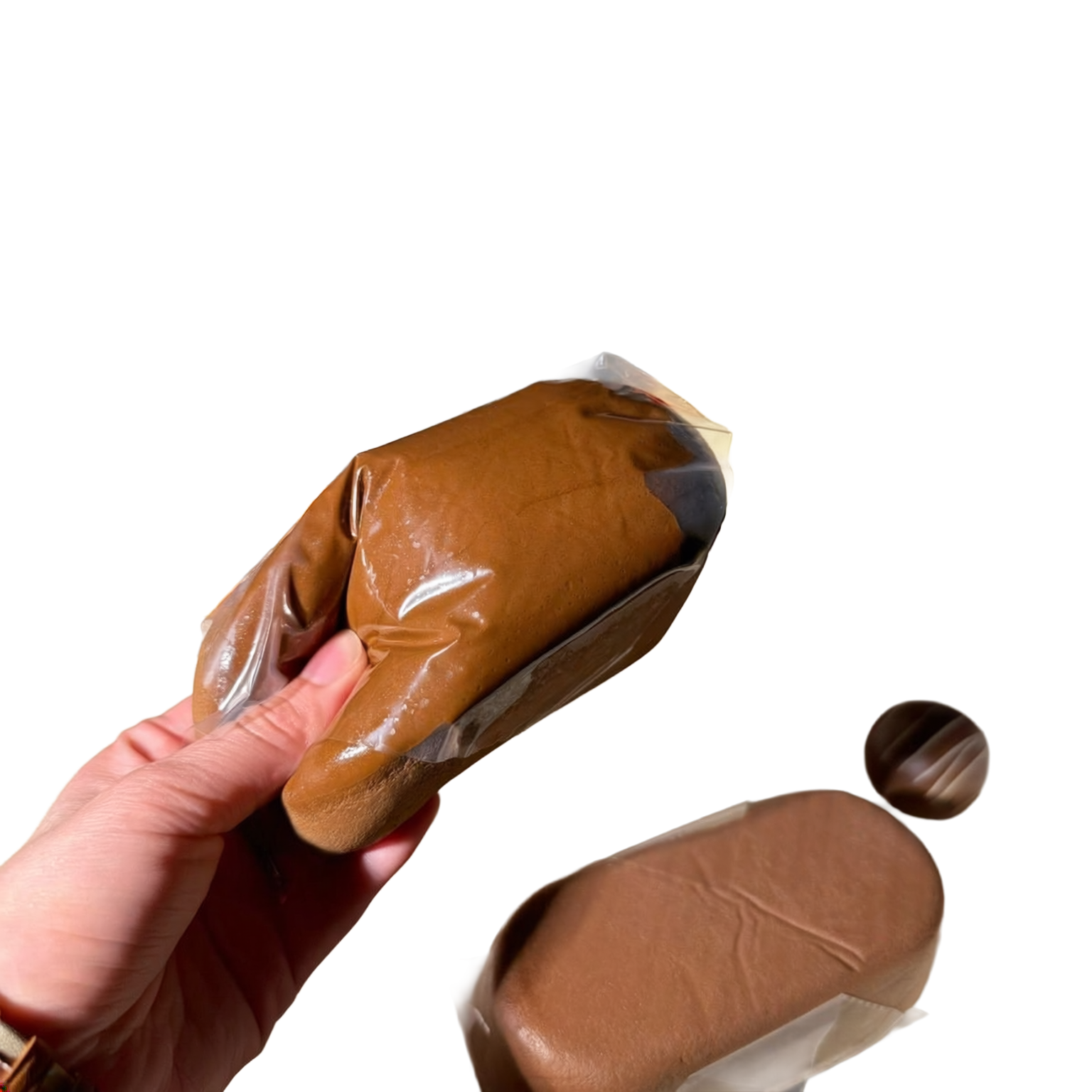 Chocolate Madeleine Squishy held in hand