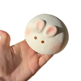 Milk Bunny Bun Squishy held in hand