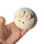 Milk Bunny Bun Squishy held in hand