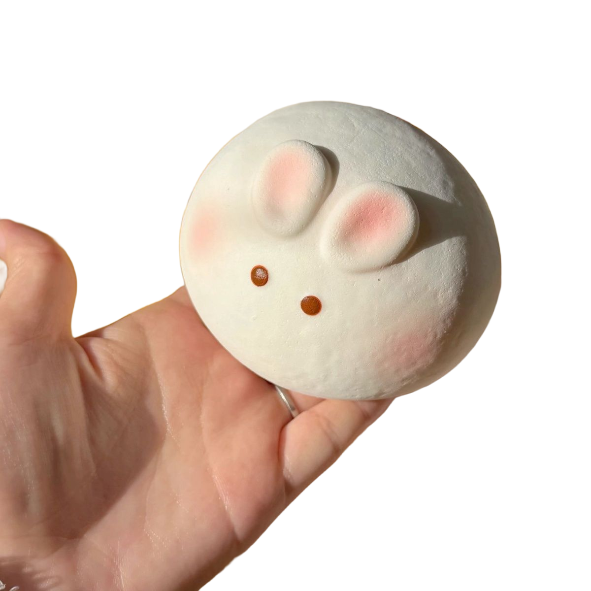 Milk Bunny Bun Squishy held in hand