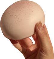 Soft Bun Squishy — strawberry soft cheese bun held in hand