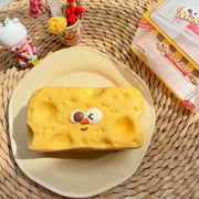 Winking Cheese Block Squishy — product photograph