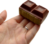Matcha Chocolate Bar Squishy — hand product