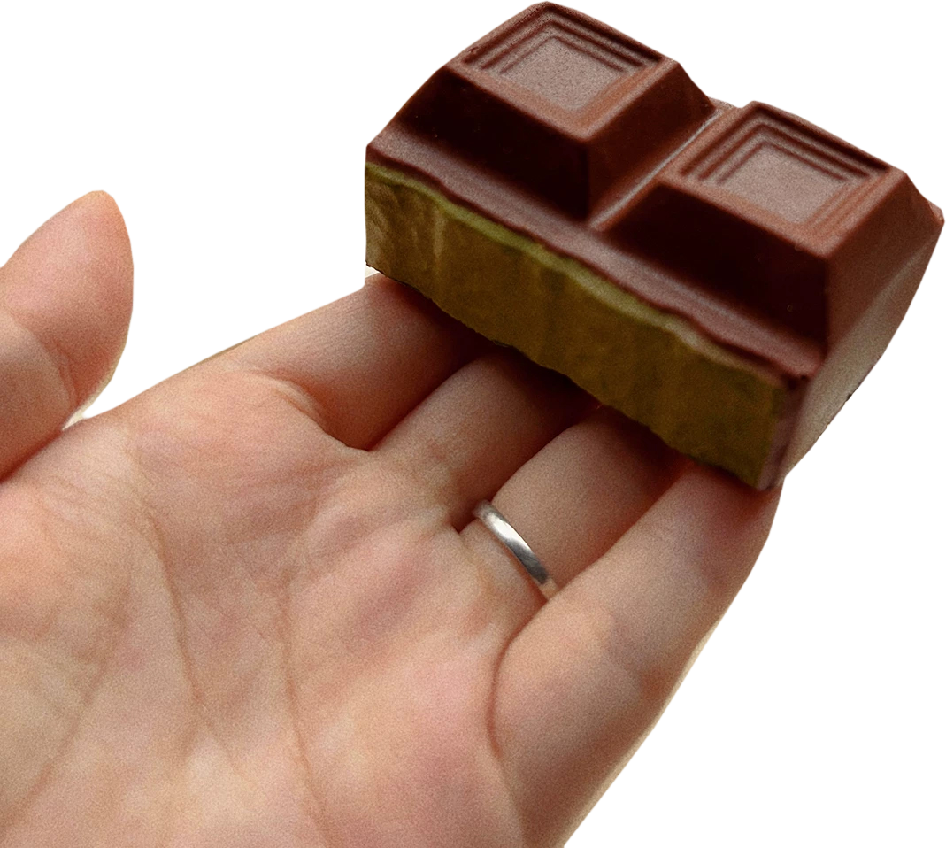 Matcha Chocolate Bar Squishy — hand product