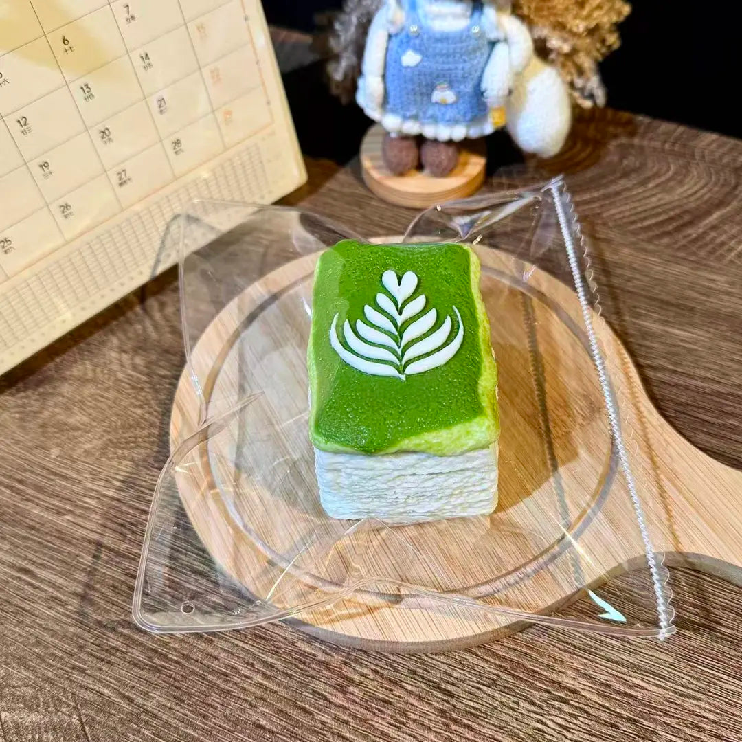 One Style — Matcha Latte Art Toast Taba Squishy