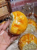 Bite Mark Bread Roll Taba Squishy — One Style — original product photograph